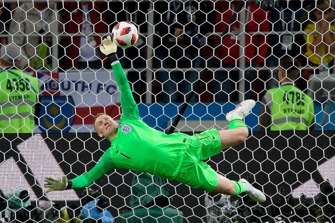 Deciphering the Penalty Specialist Goalkeeper: Mind Games and Metrics